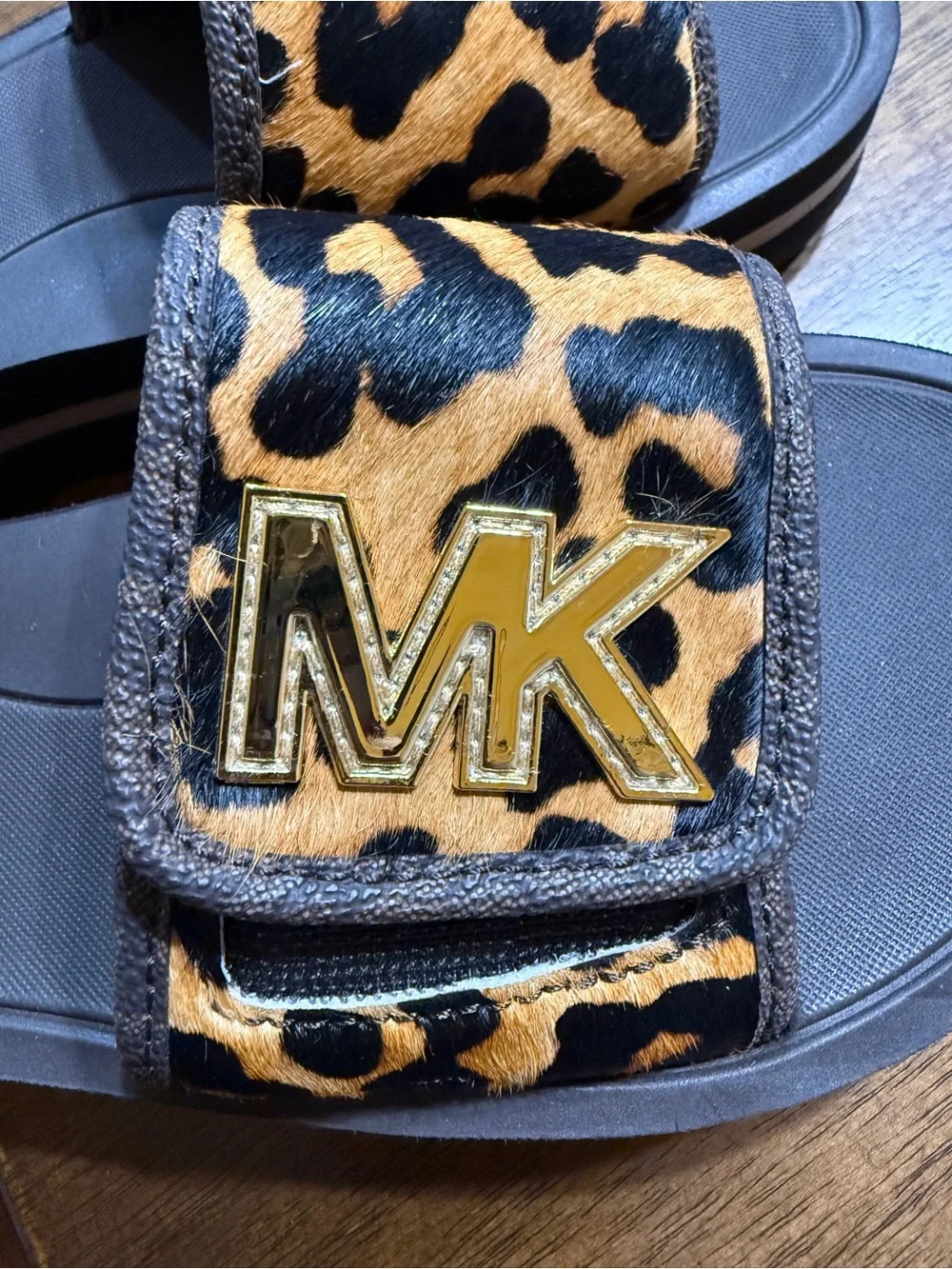 MICHAEL Michael Kors Black Footbed Leopard Print Slide Sandals with Gold MK Logo